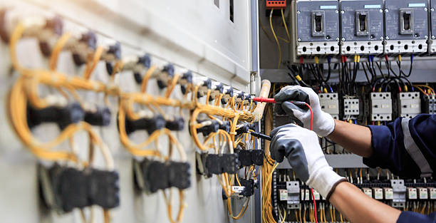 Professional Electrician technician working in Arab, AL